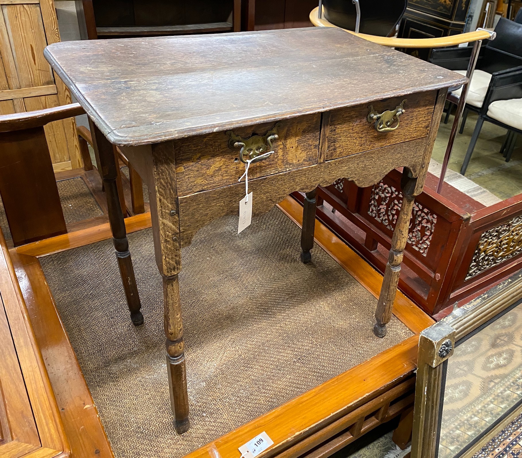 An 18th century oak side table, width 71cm, depth 45cm, height 72cm
